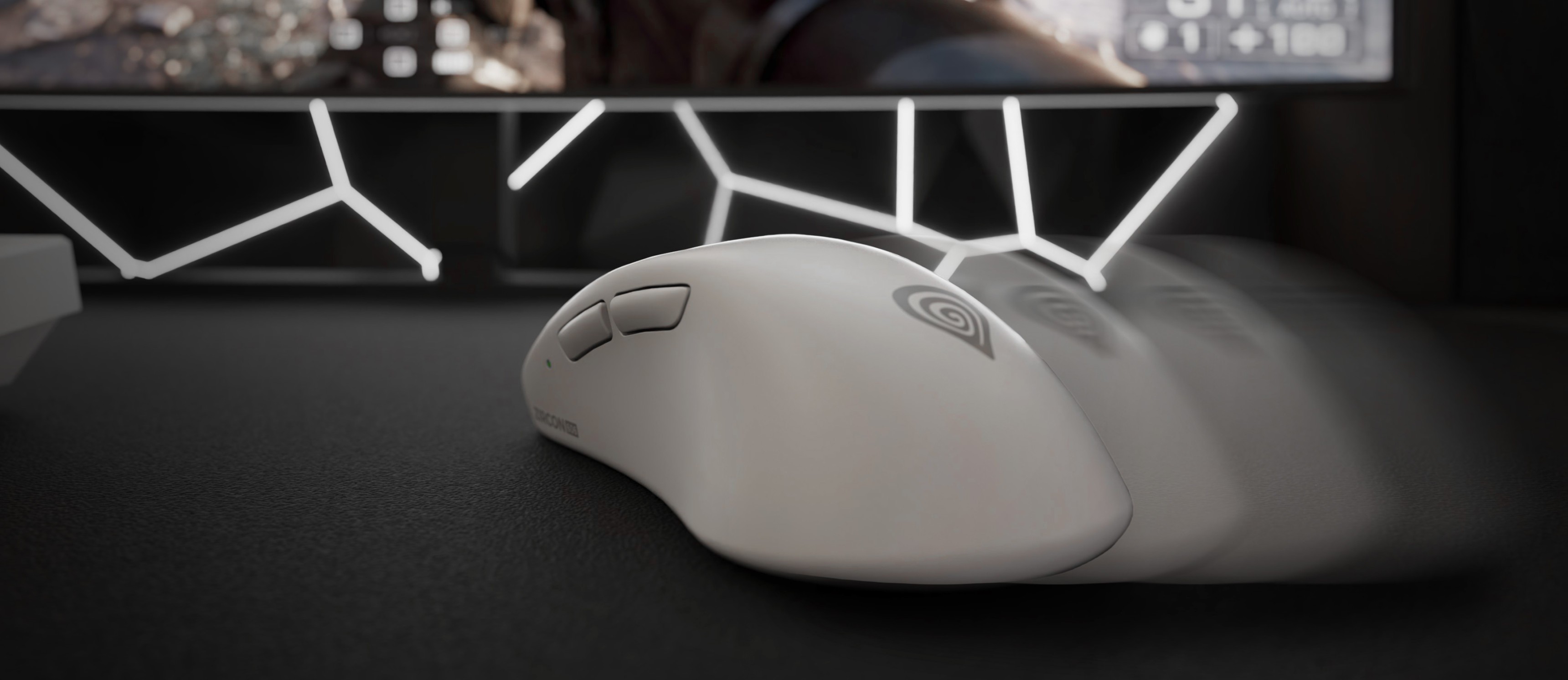 White computer mouse on a black desk with motion blur effect and a light background.