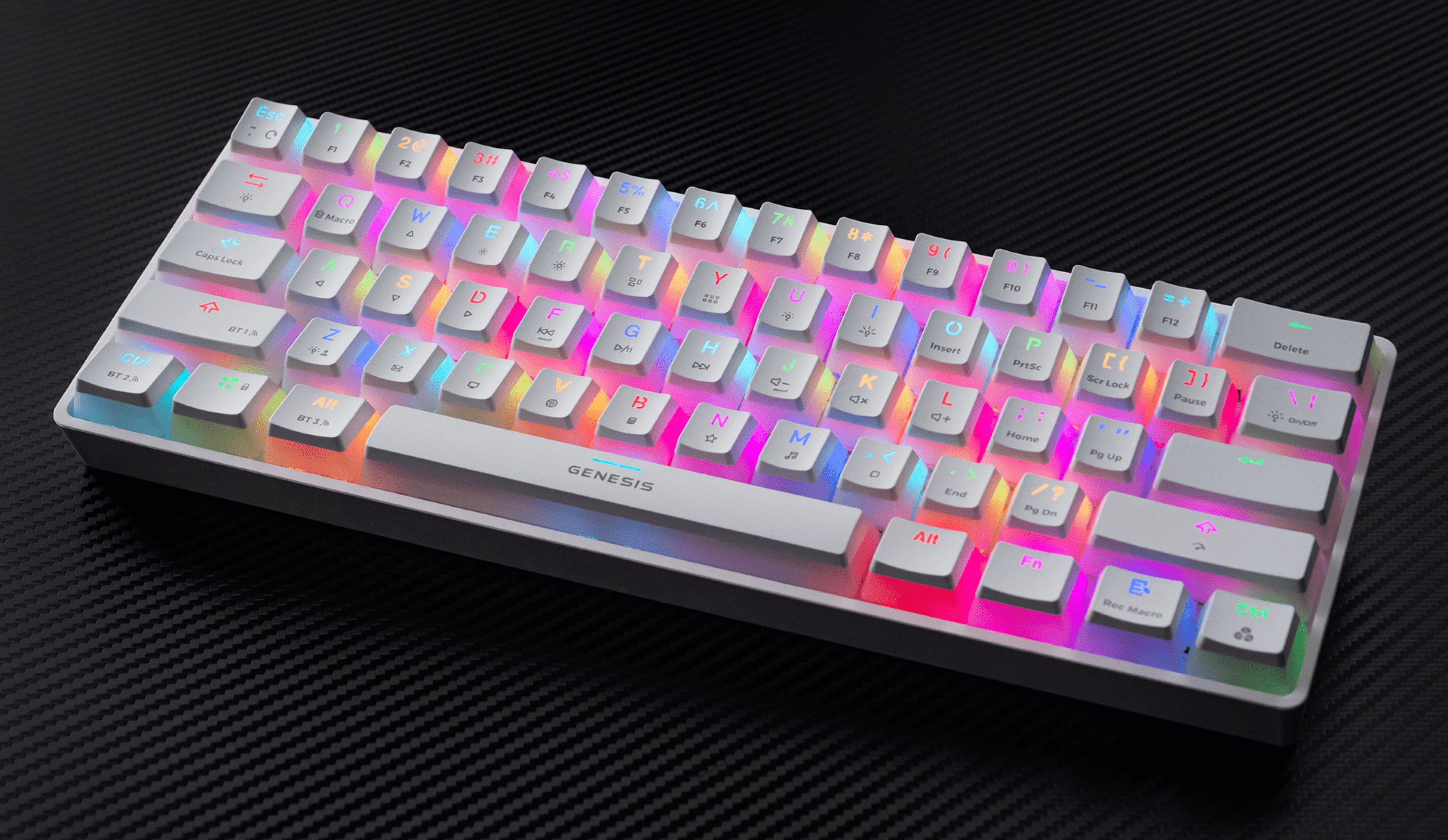 Keyboard with colorful backlighting and white keycaps on a black textured surface.