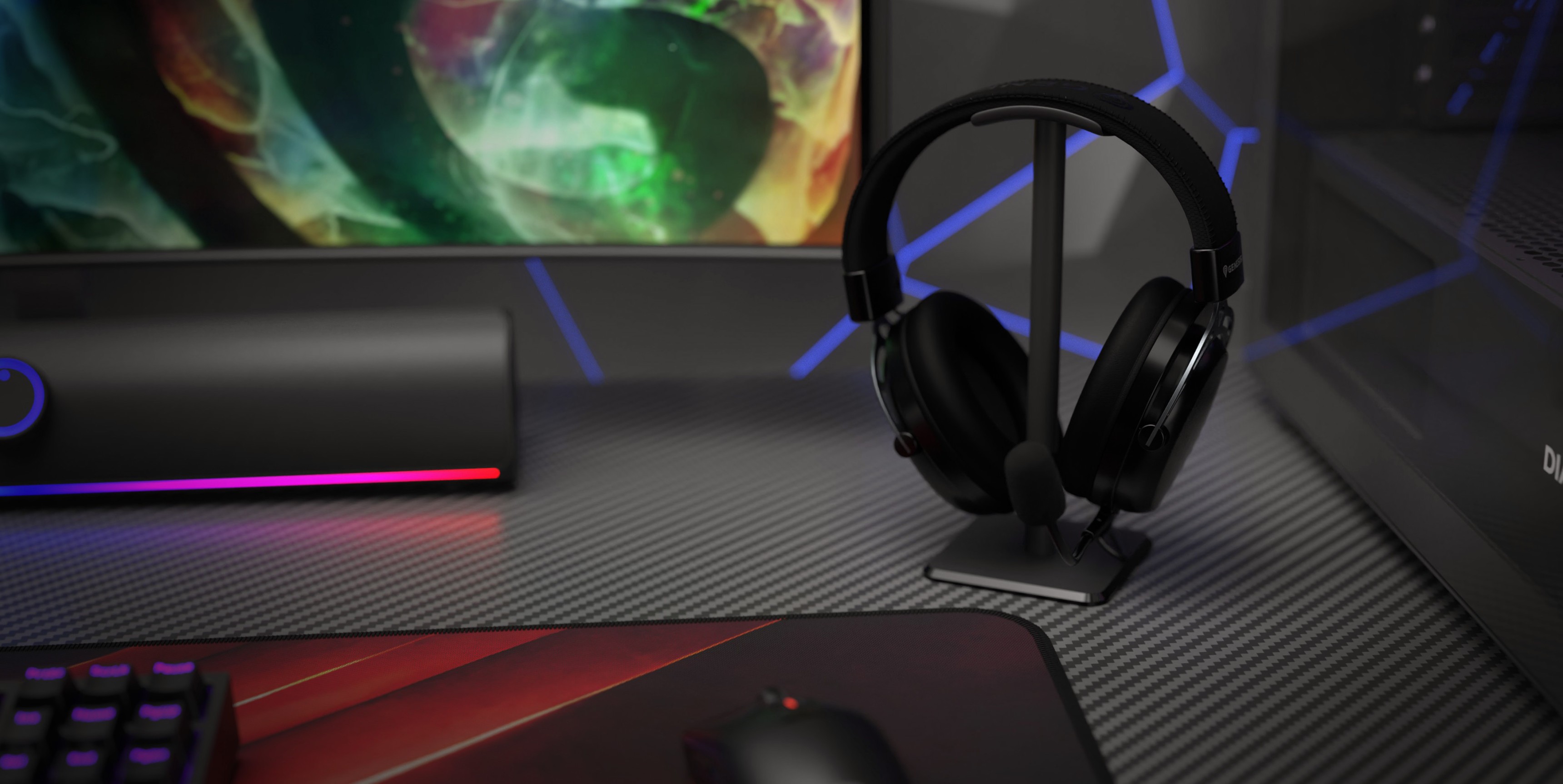 Black headset stand for Genesis Thulium 100, positioned on a gaming desk with a textured surface and colorful RGB lighting