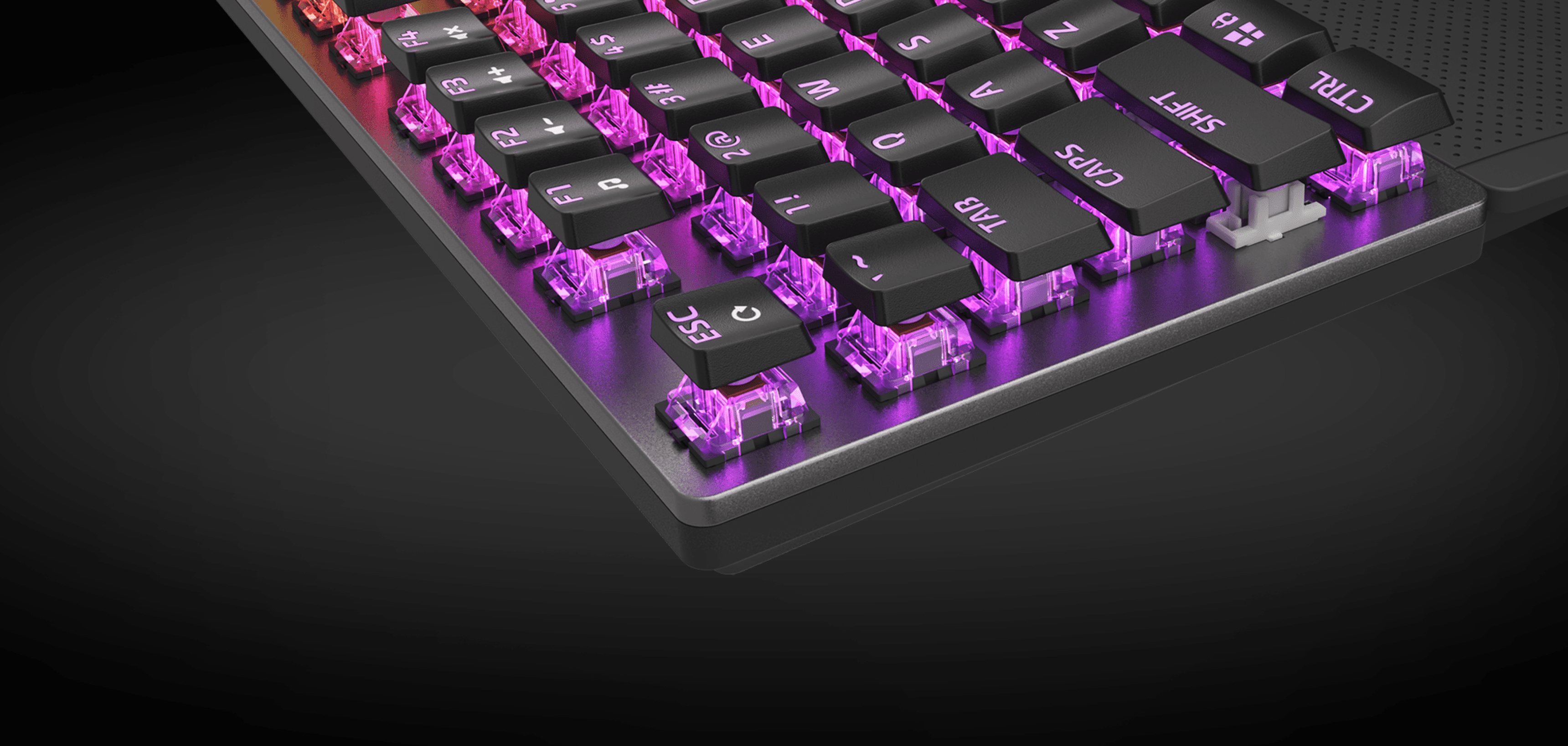Keyboard with colorful glowing keys and a sleek design on a dark background.