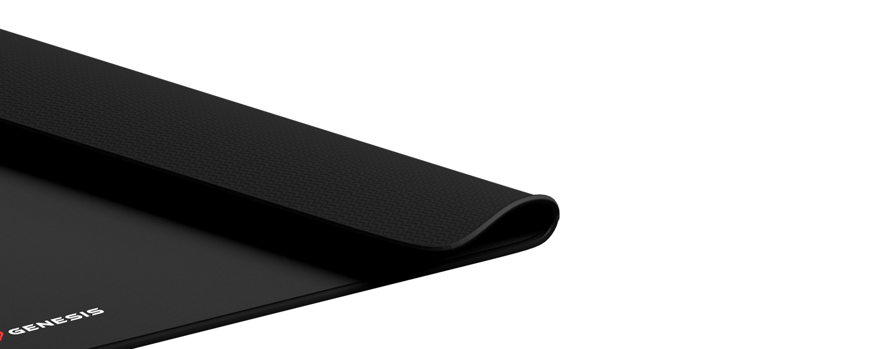 Black Genesis Carbon mouse pad with textured surface, measuring 500x400mm, featuring a subtle logo in the corner
