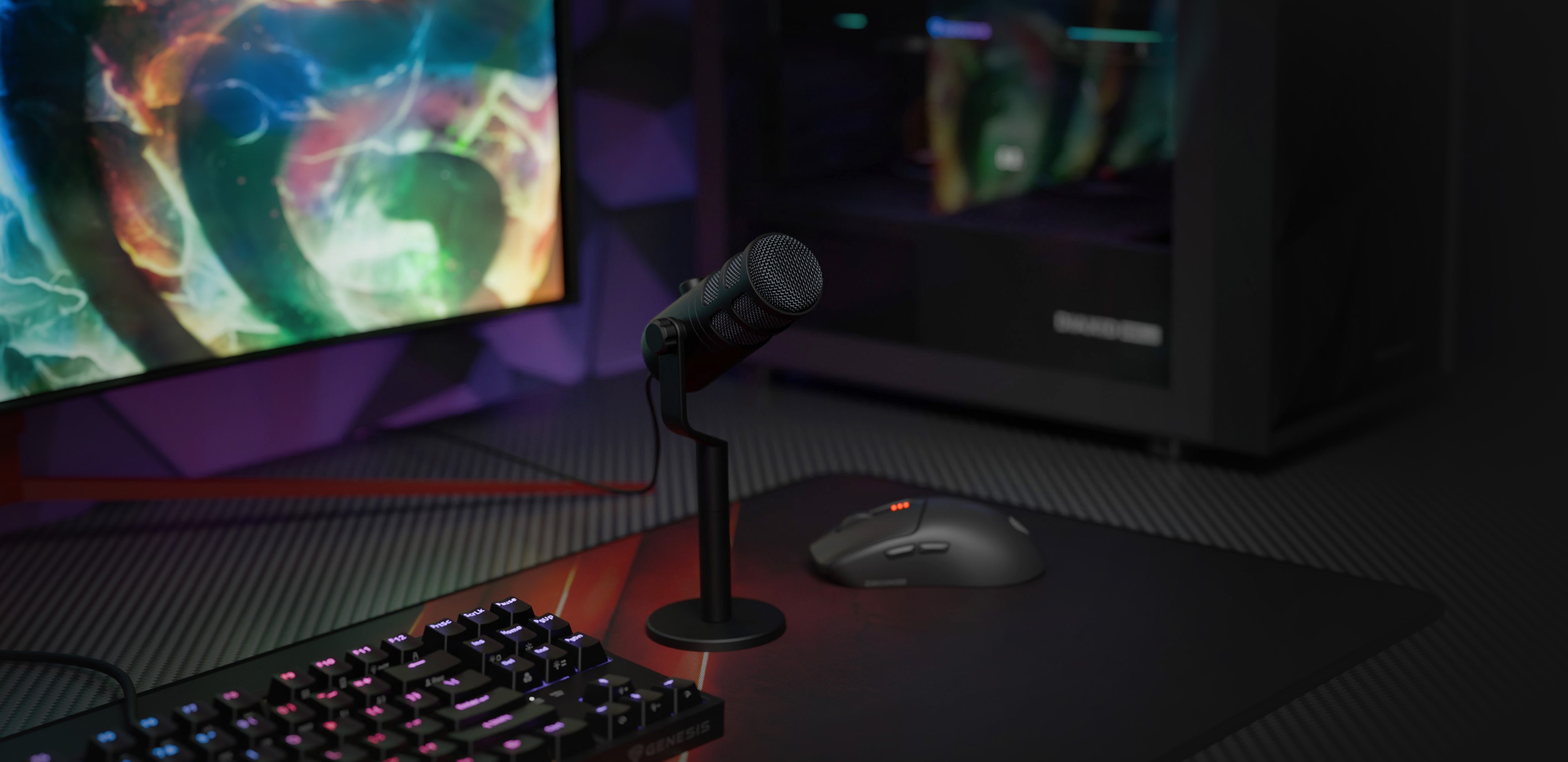 Dynamic USB microphone on a stand with a keyboard and mouse, set against a colorful gaming monitor backdrop