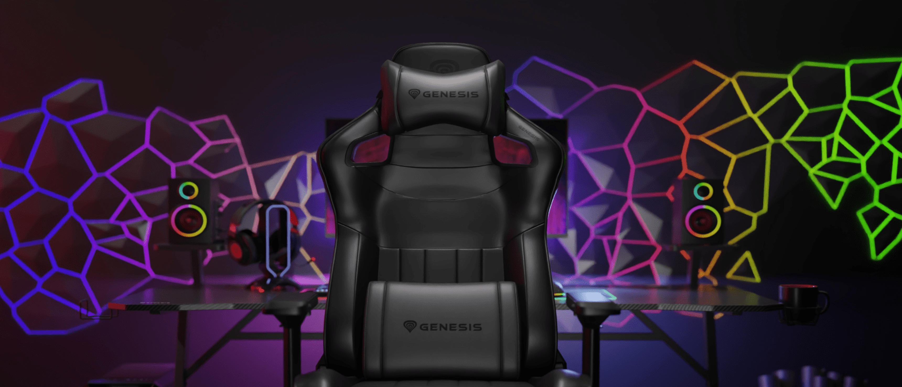 Black gaming chair with red accents, set against a colorful neon background with speakers and a desk