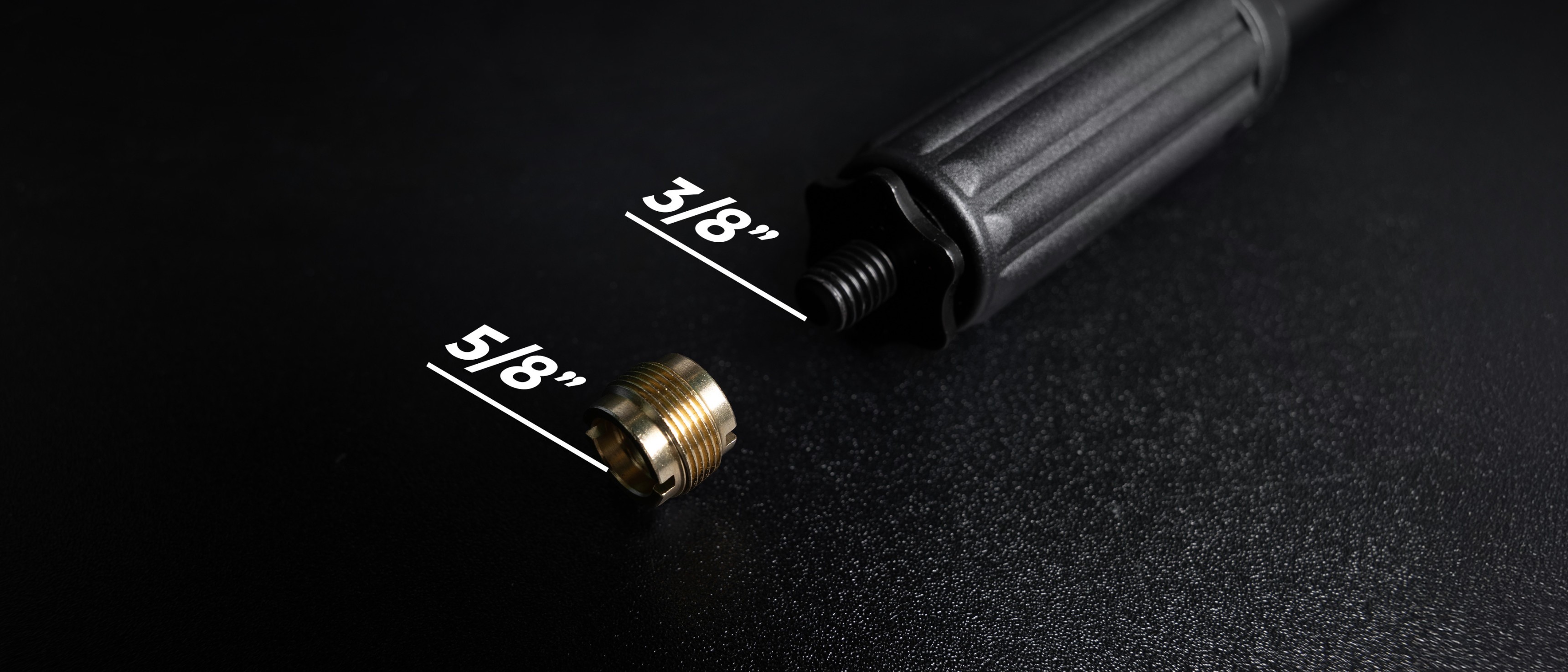 Microphone stand with a detachable screw adapter, showing 3/8" and 5/8" measurements on a dark background