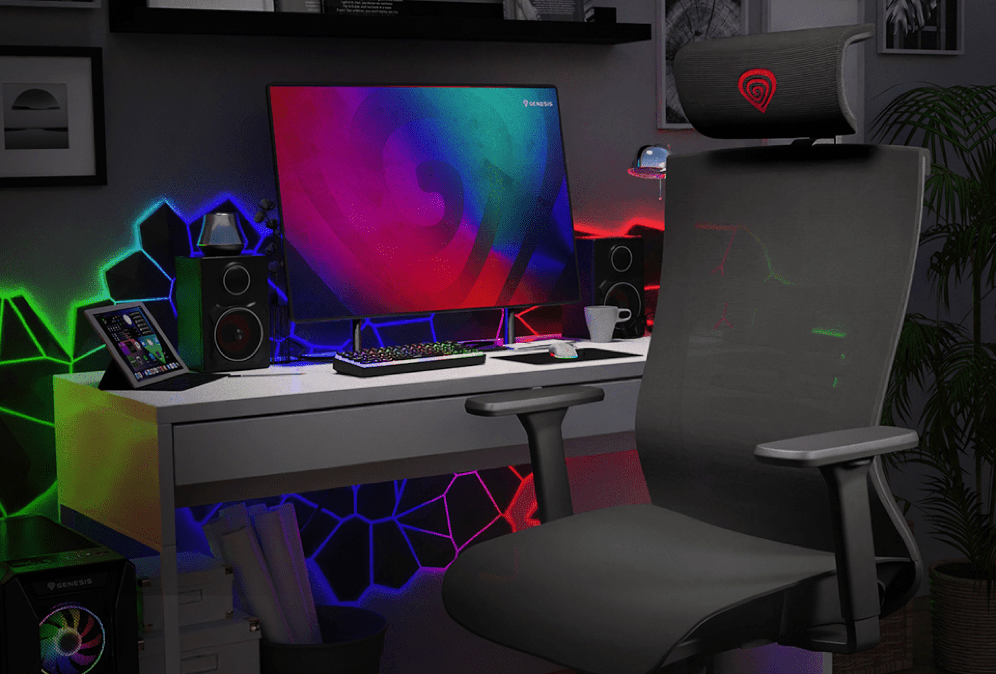 Ergonomic black gaming chair positioned at a stylish workspace with a large monitor, colorful lights, and tech accessories