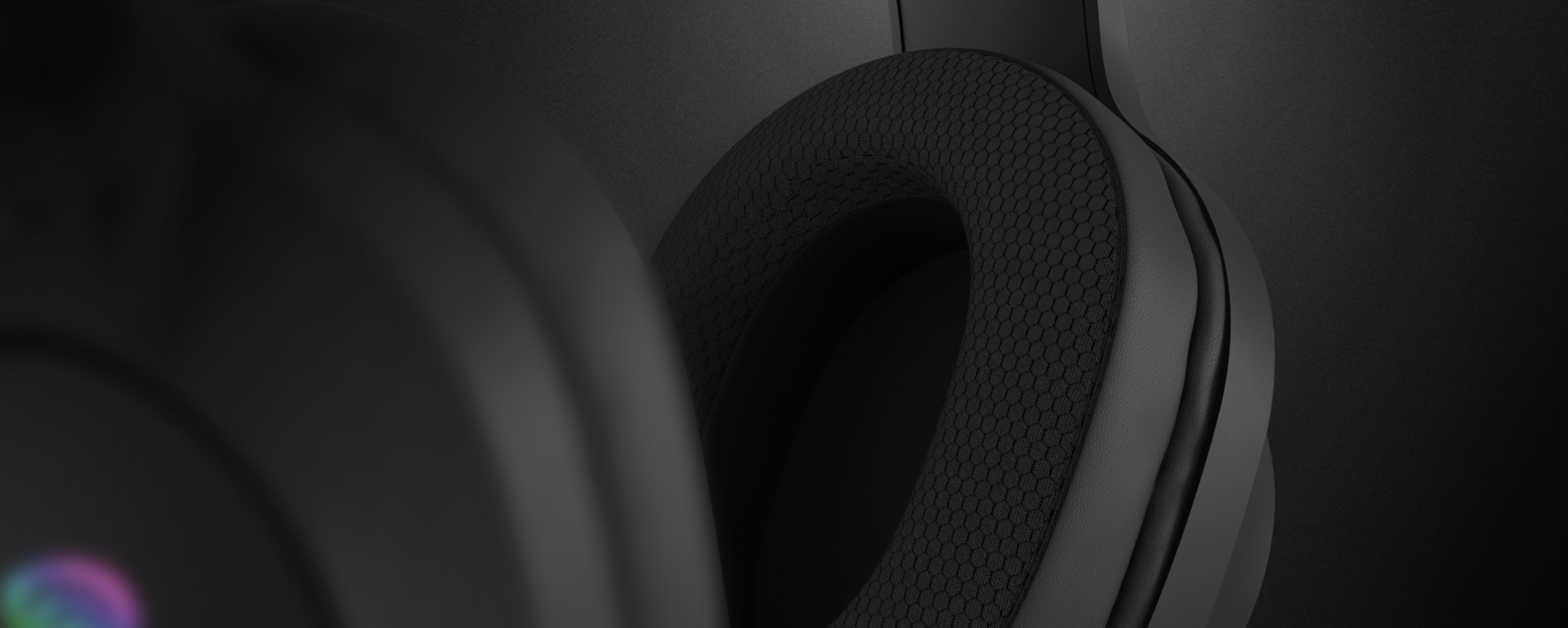 Black over-ear headphones with RGB lighting and a microphone