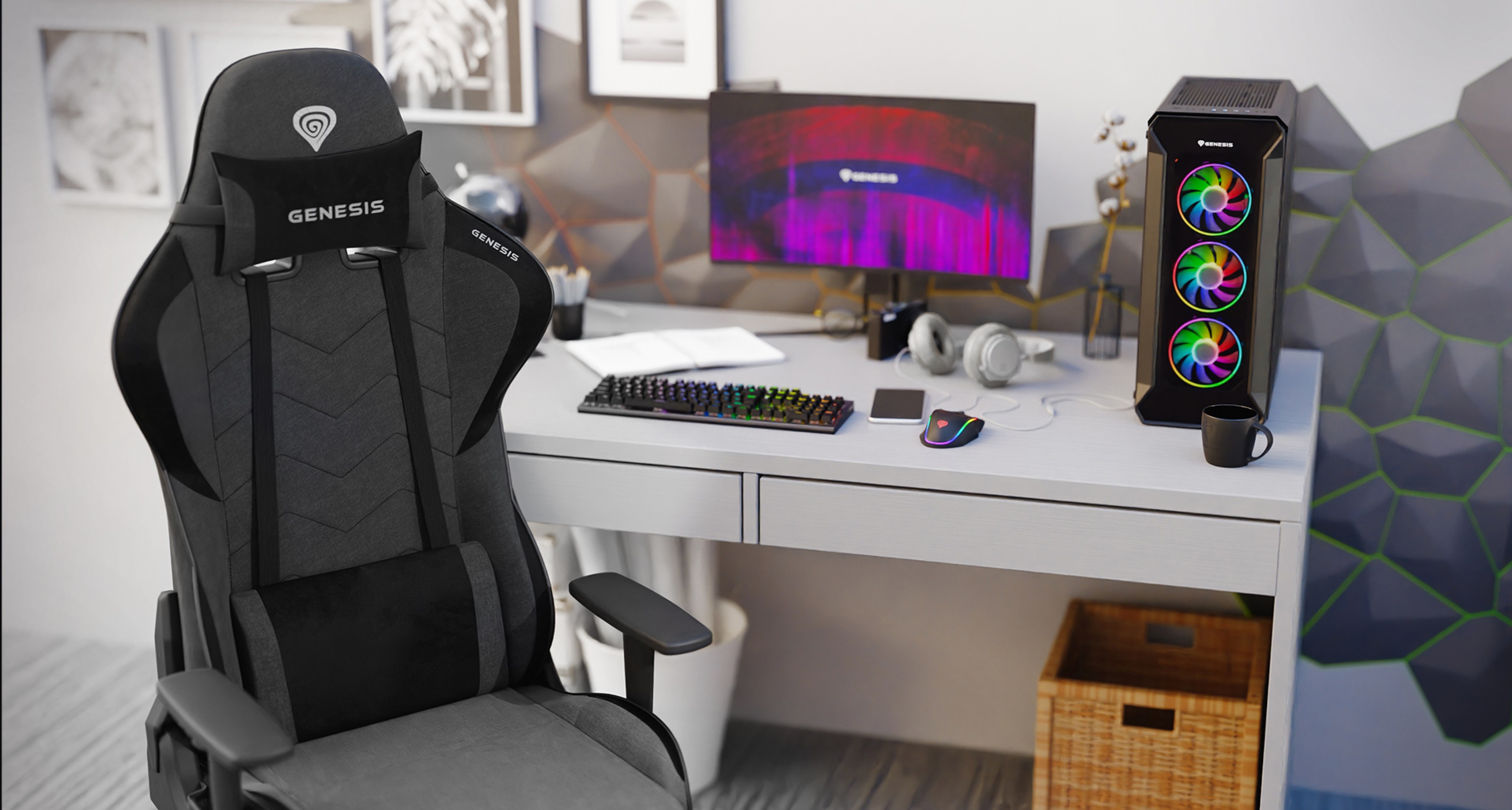 Gray Genesis Nitro 550 G2 gaming chair next to a modern desk with a colorful keyboard, mouse, headphones, and a gaming PC