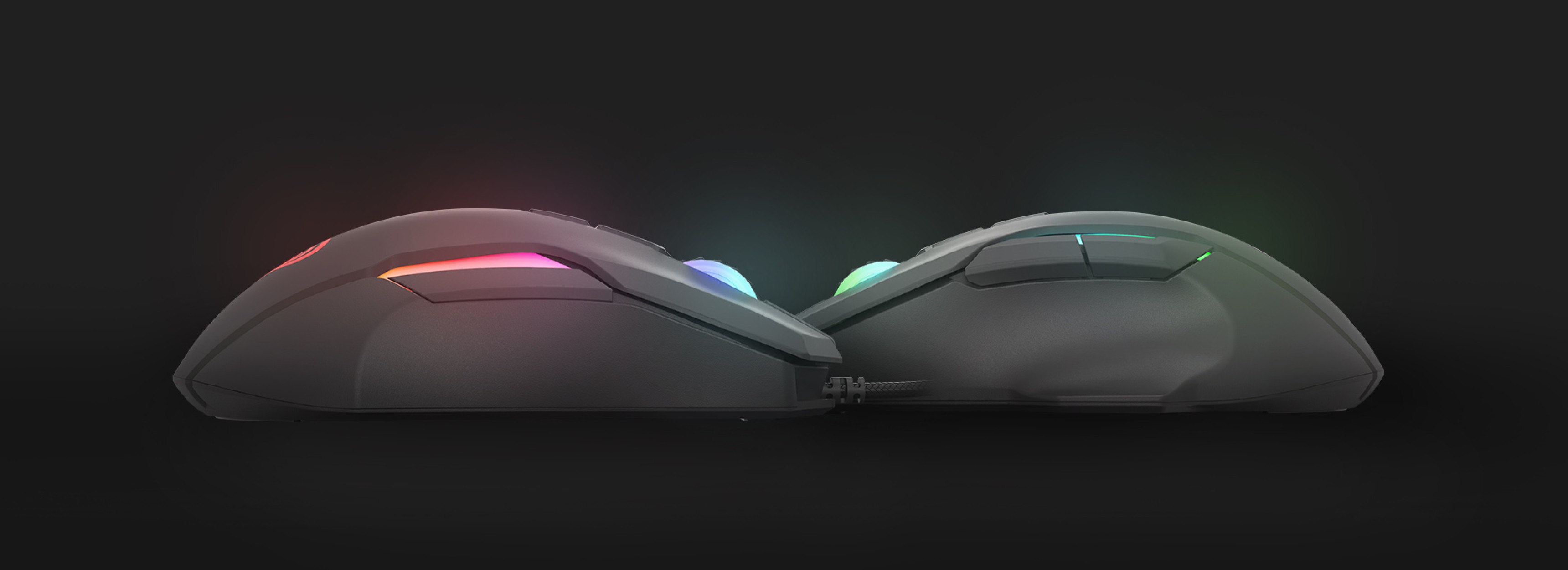 Side view of the Genesis Xenon 220 gaming mouse, featuring RGB lighting and a sleek black design