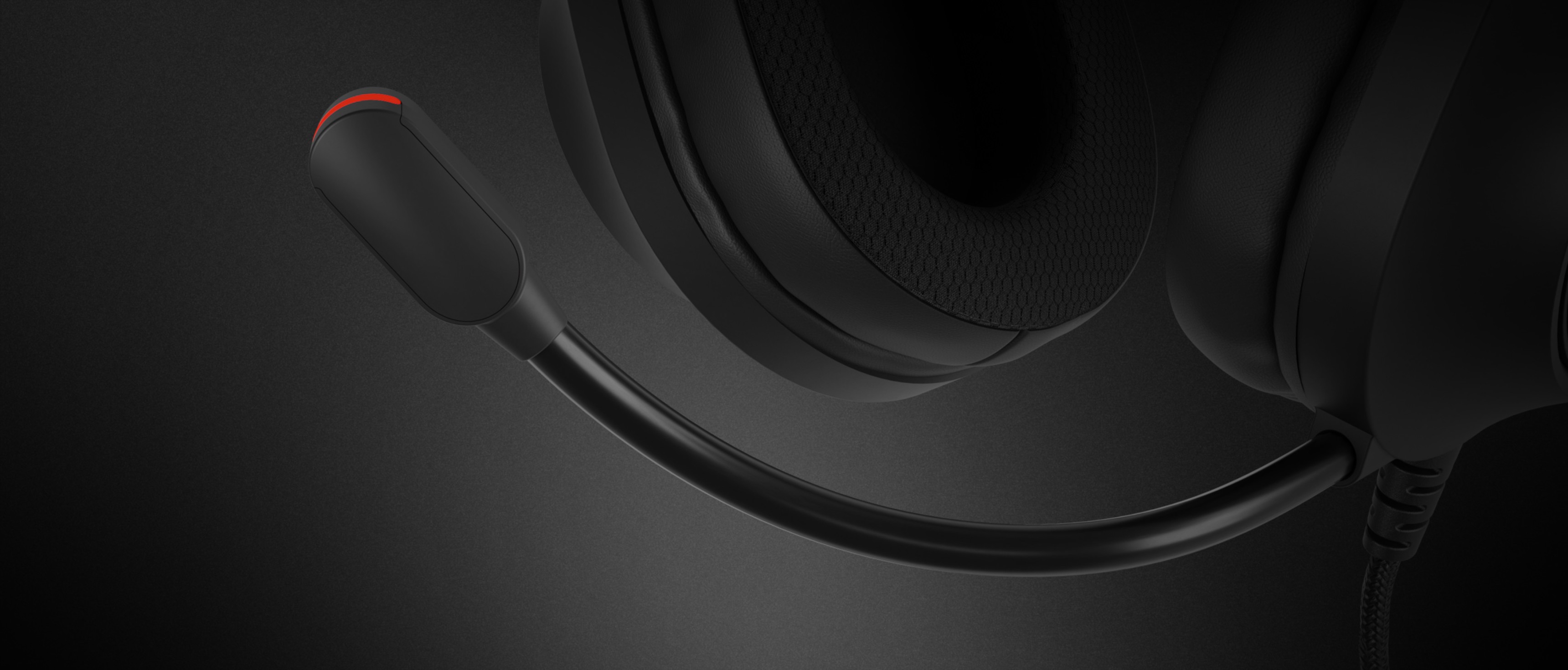 Black over-ear headphones with a flexible microphone and illuminated detail