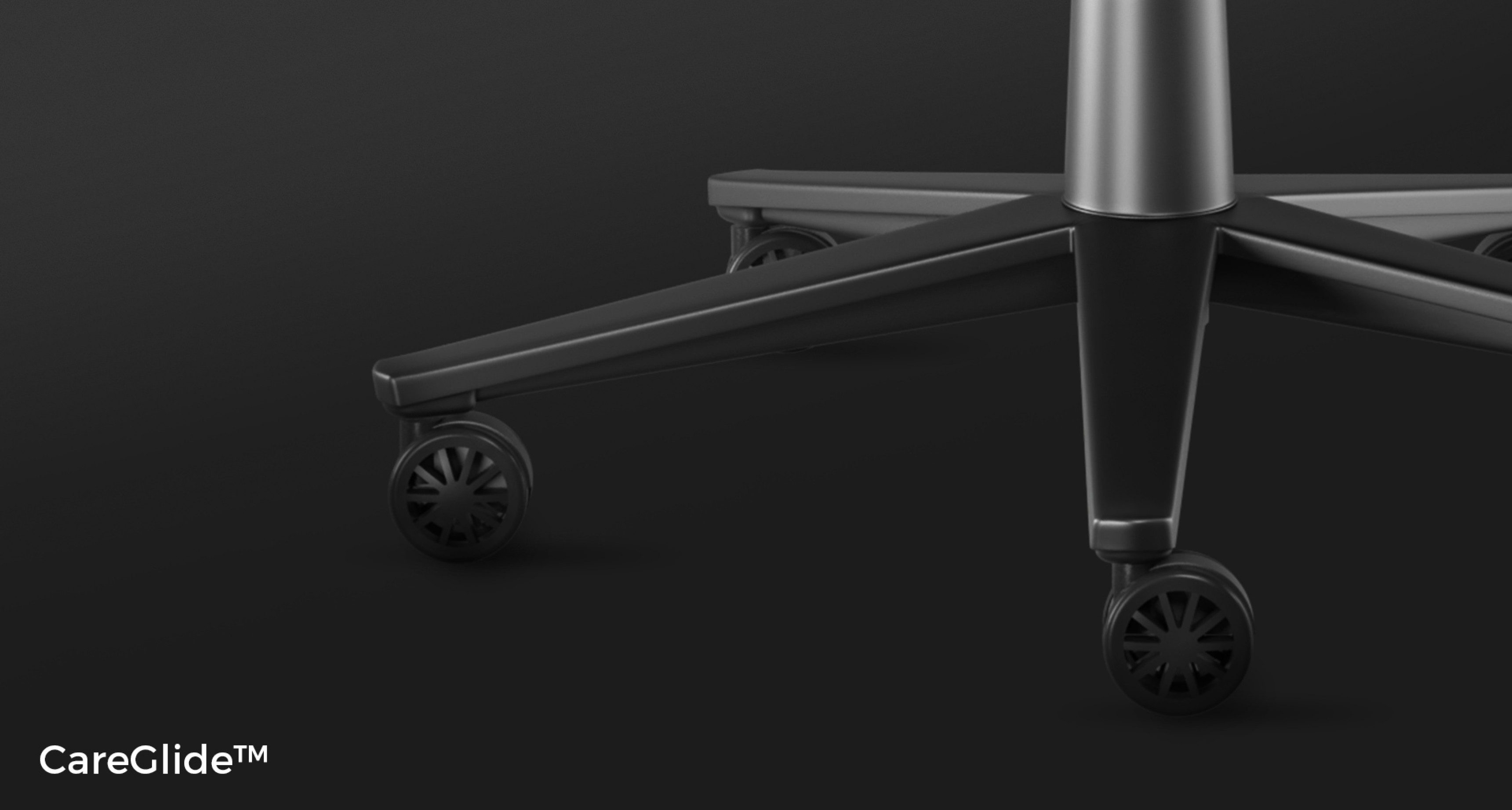 Close-up of the base and wheels of the Genesis Nitro 550 G2 gaming chair in gray, showcasing its CareGlide™ system