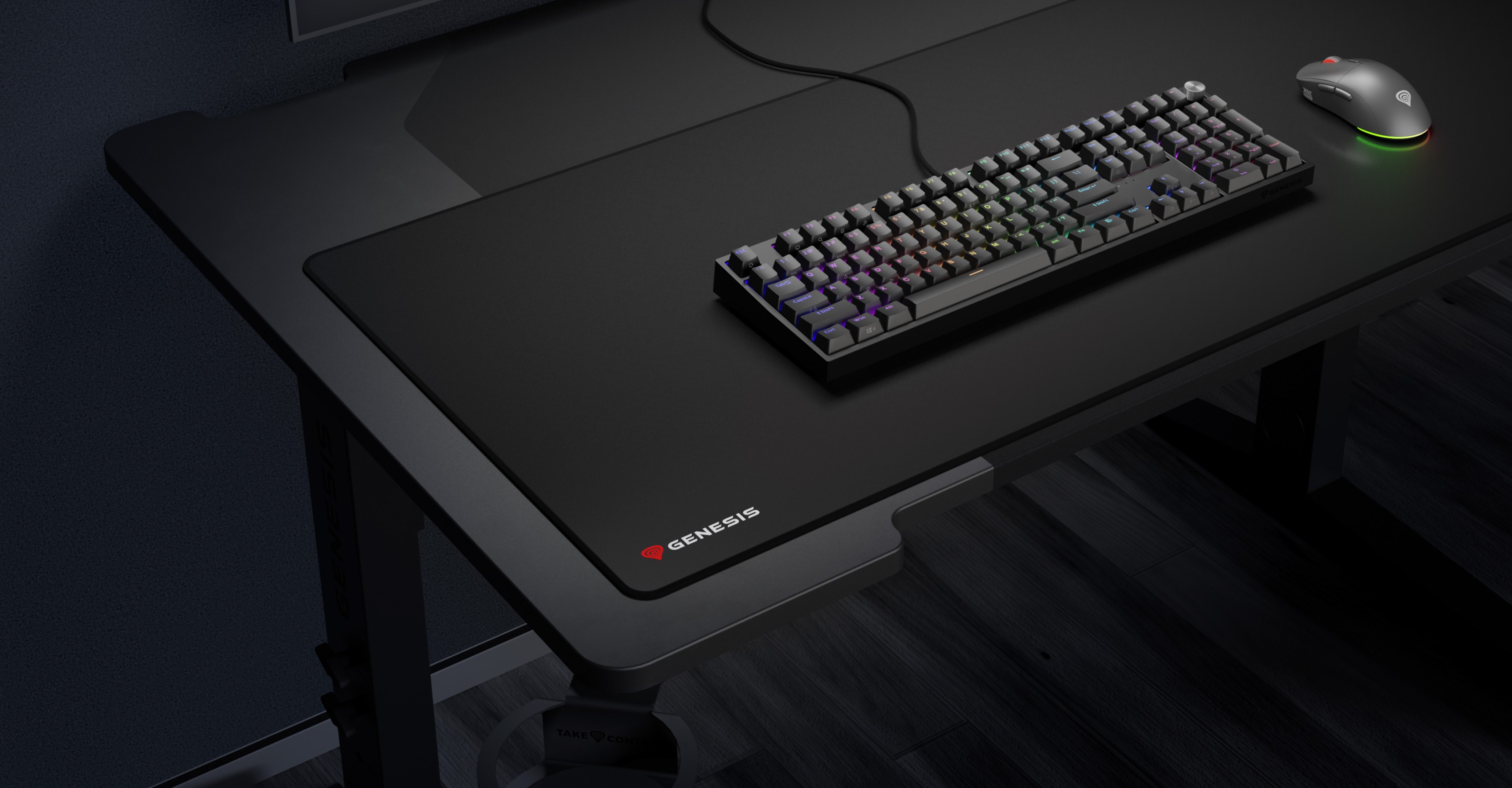 Large mouse pad with a smooth surface, keyboard, and mouse on a gaming desk