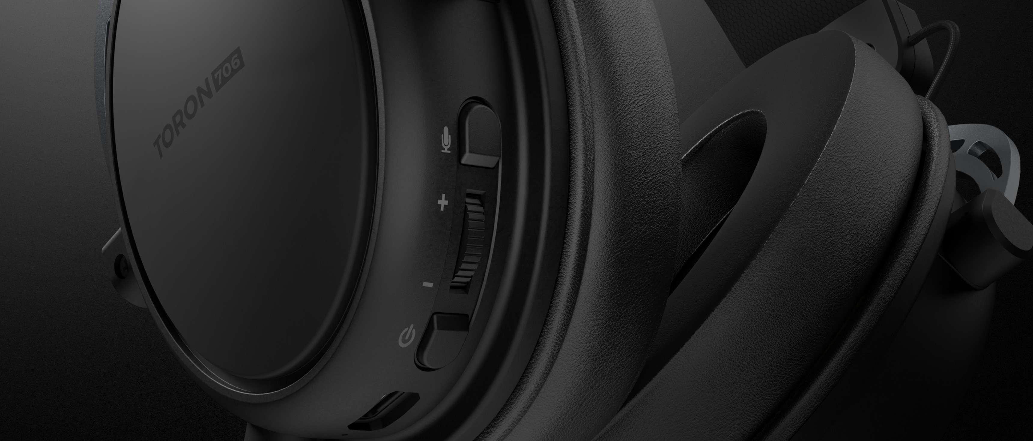 Black wireless headphones with a microphone featuring volume controls and power button