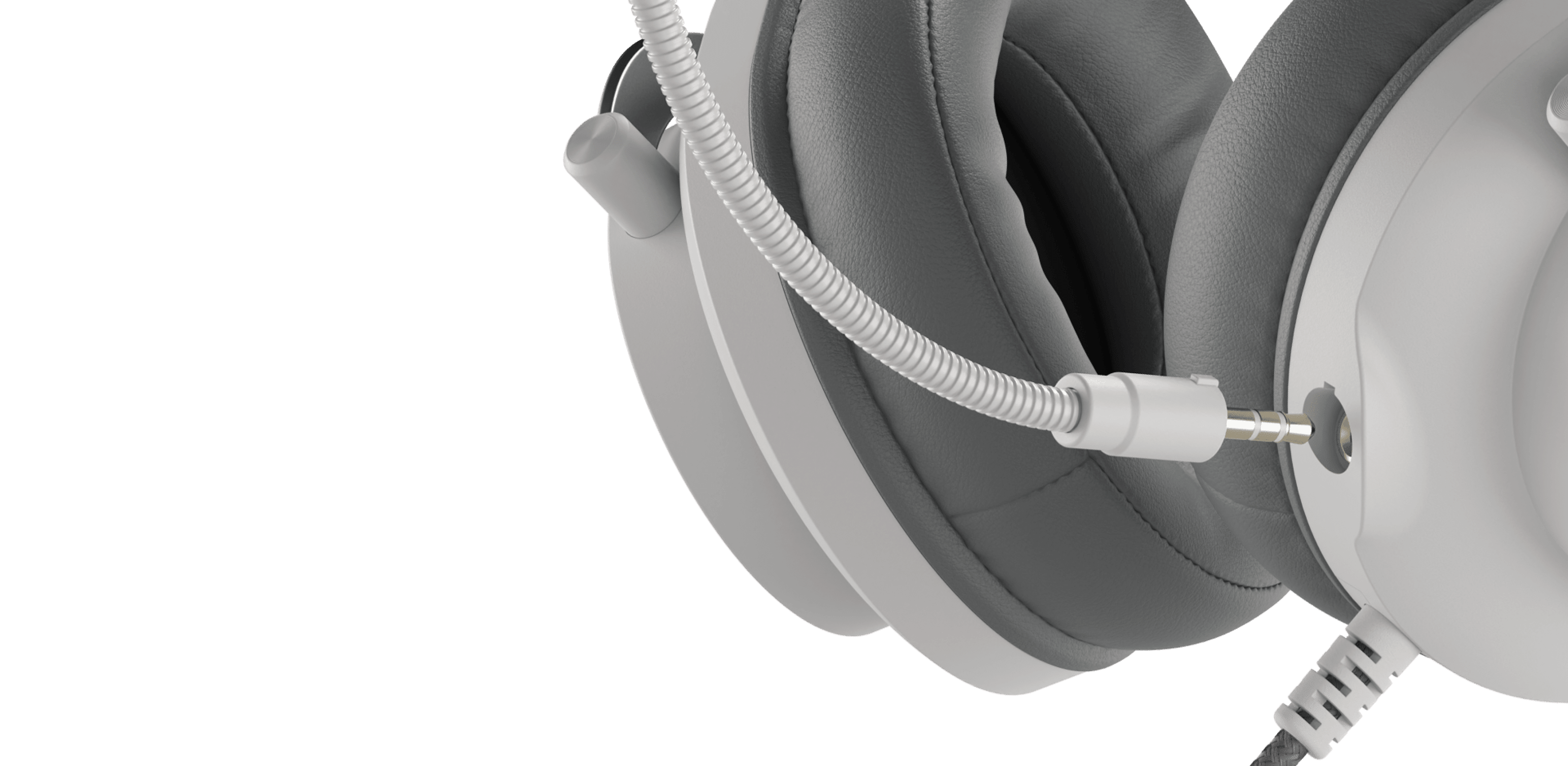 Headphones with a thick headband and cushioned ear cups, featuring a connection cable.