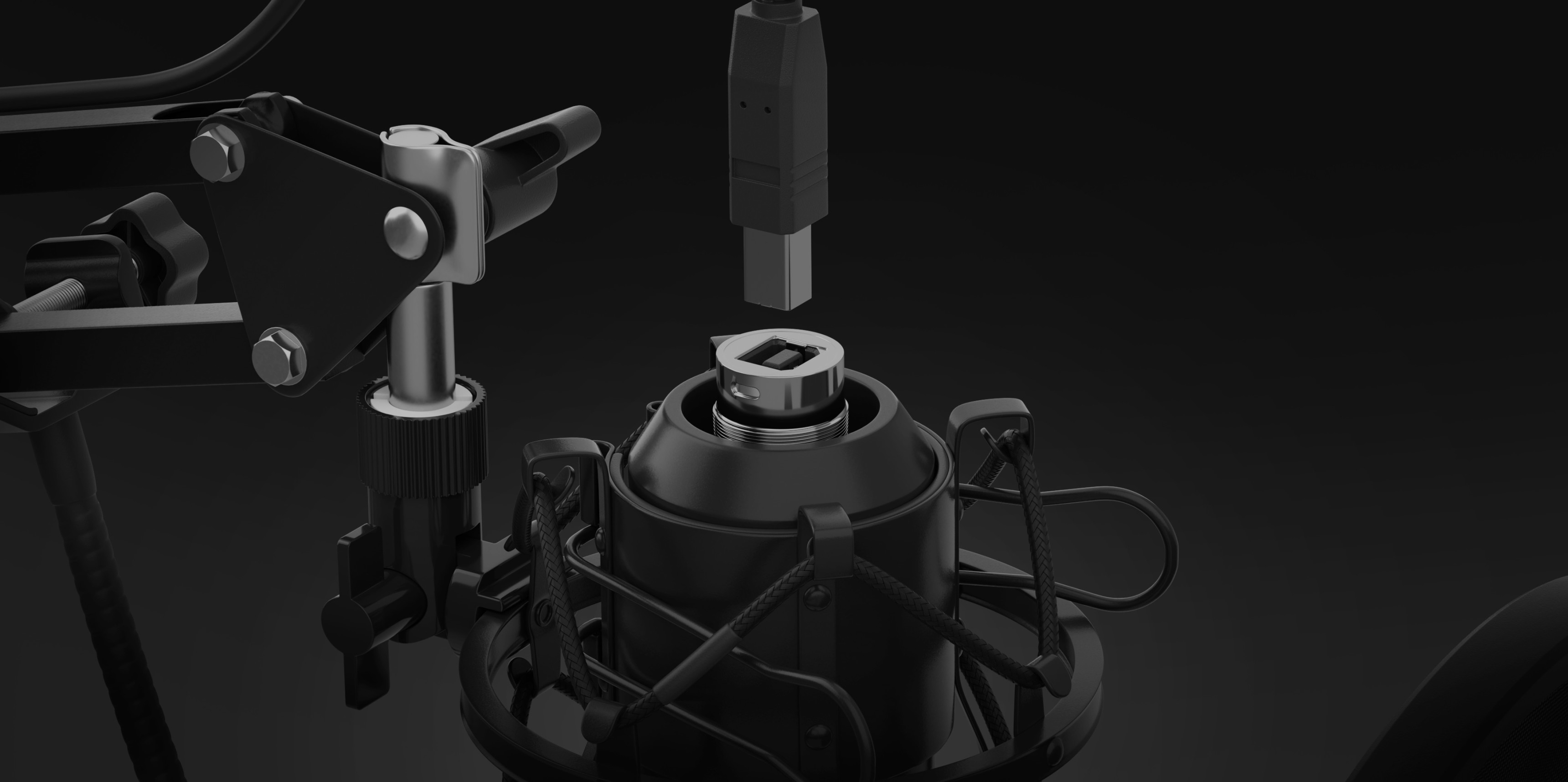 Microphone capsule being attached to a sturdy mount with a connection piece above.