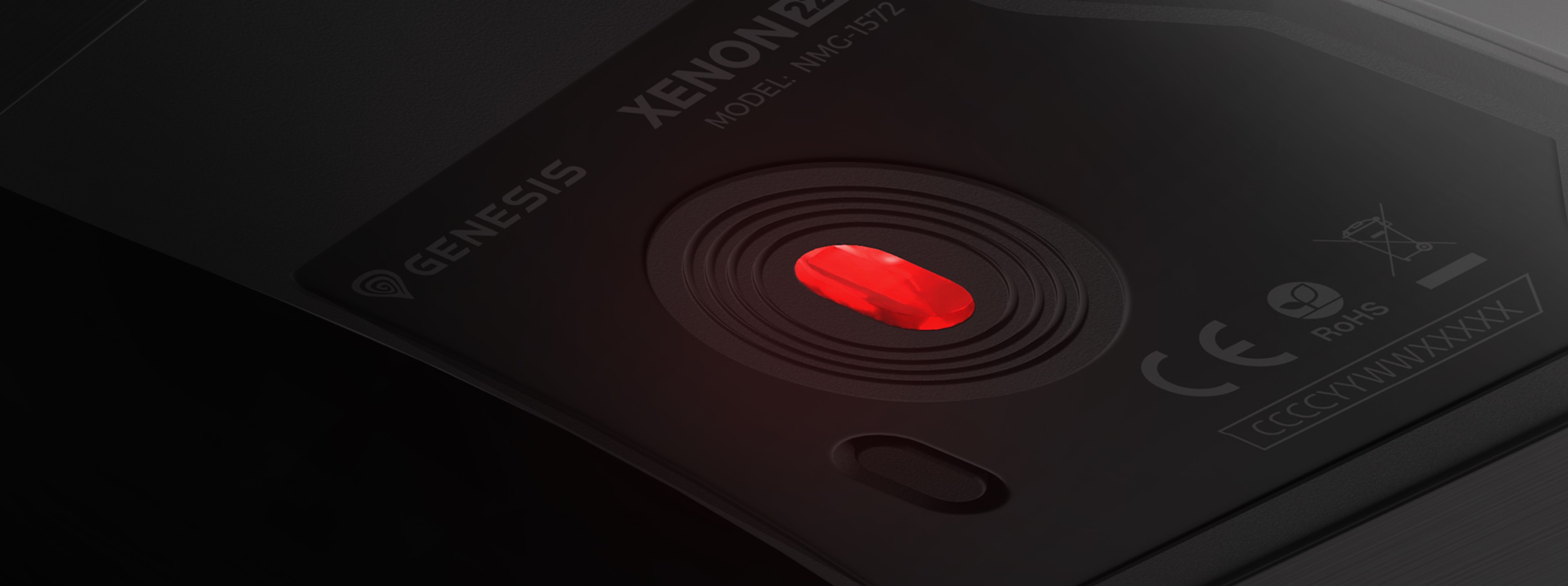 Close-up of the Genesis Xenon 220 G2 gaming mouse featuring a red sensor light and smooth surface for enhanced performance