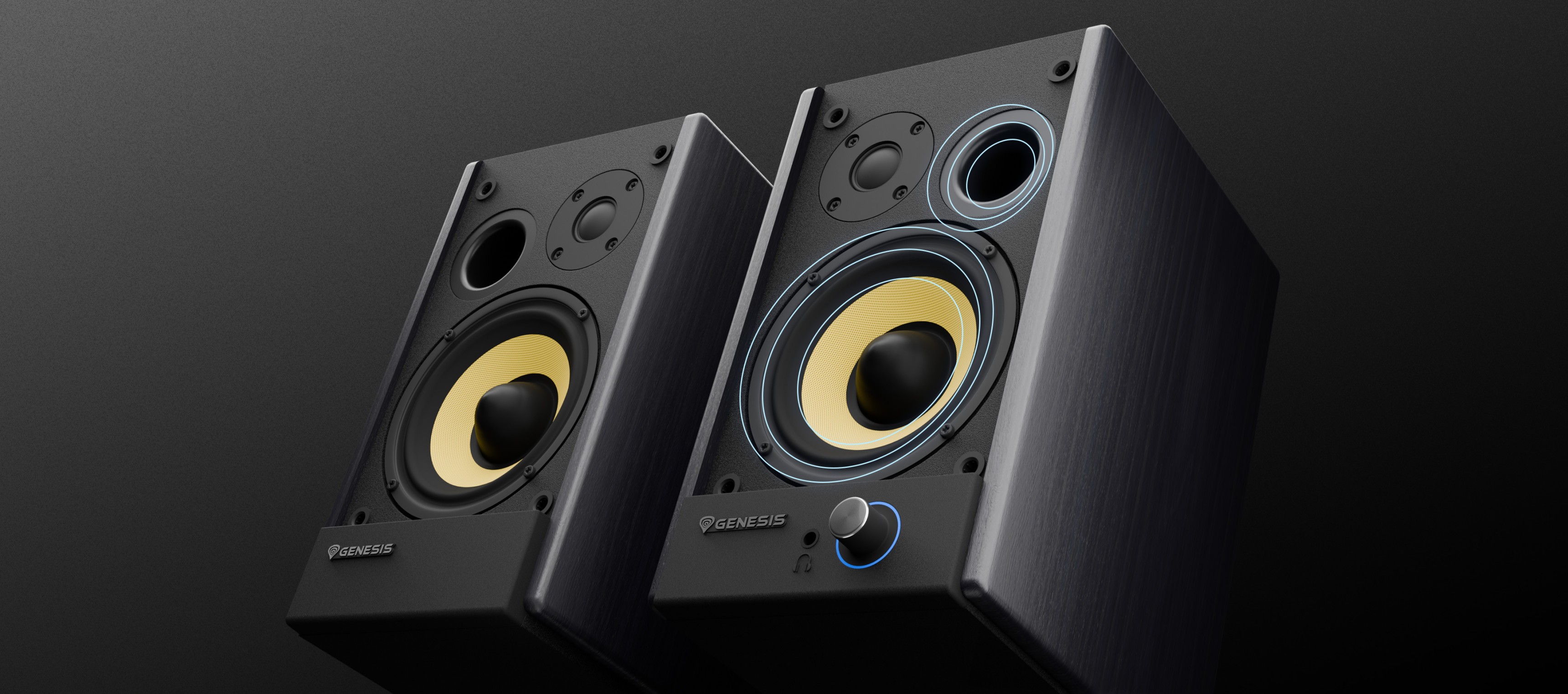Home audio speakers with a sleek black design and yellow acoustic drivers.