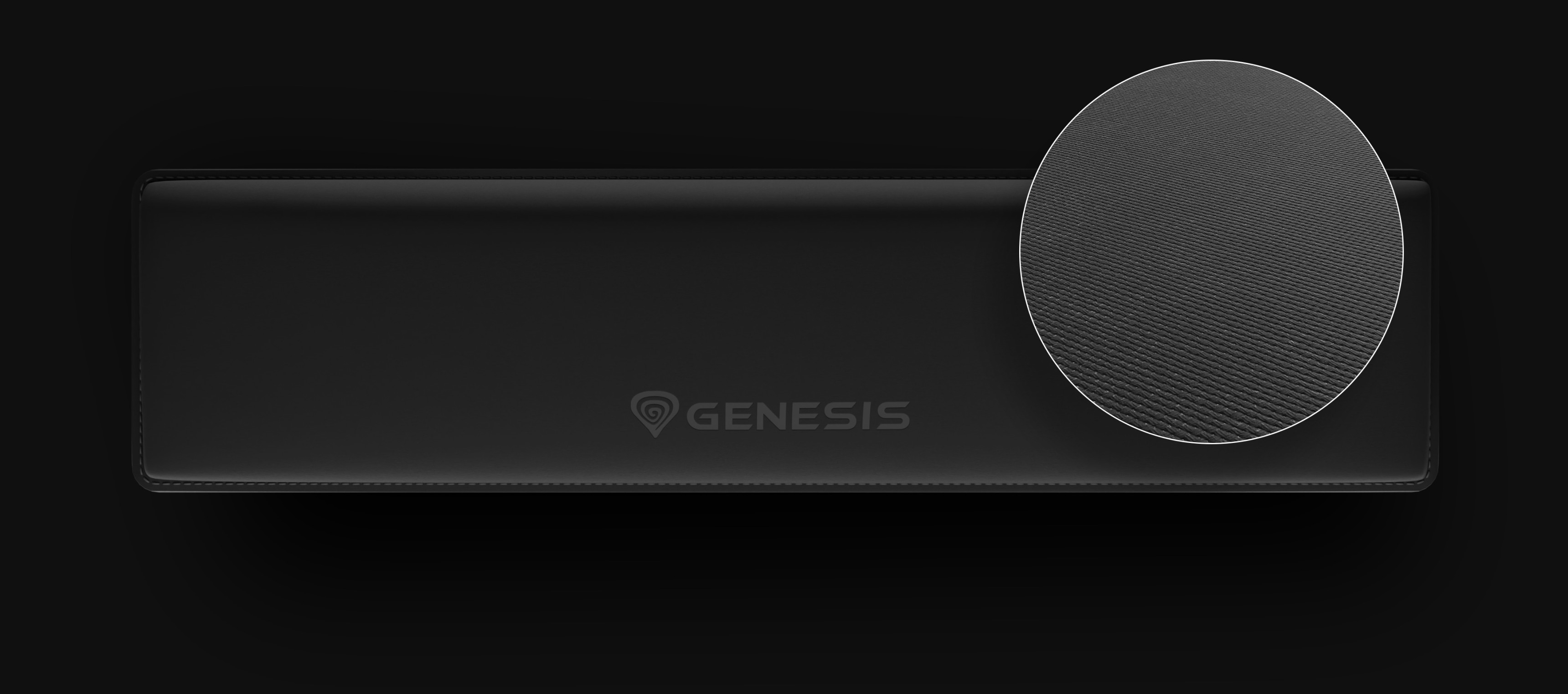 A black gaming mouse pad with a textured circular area in the corner.