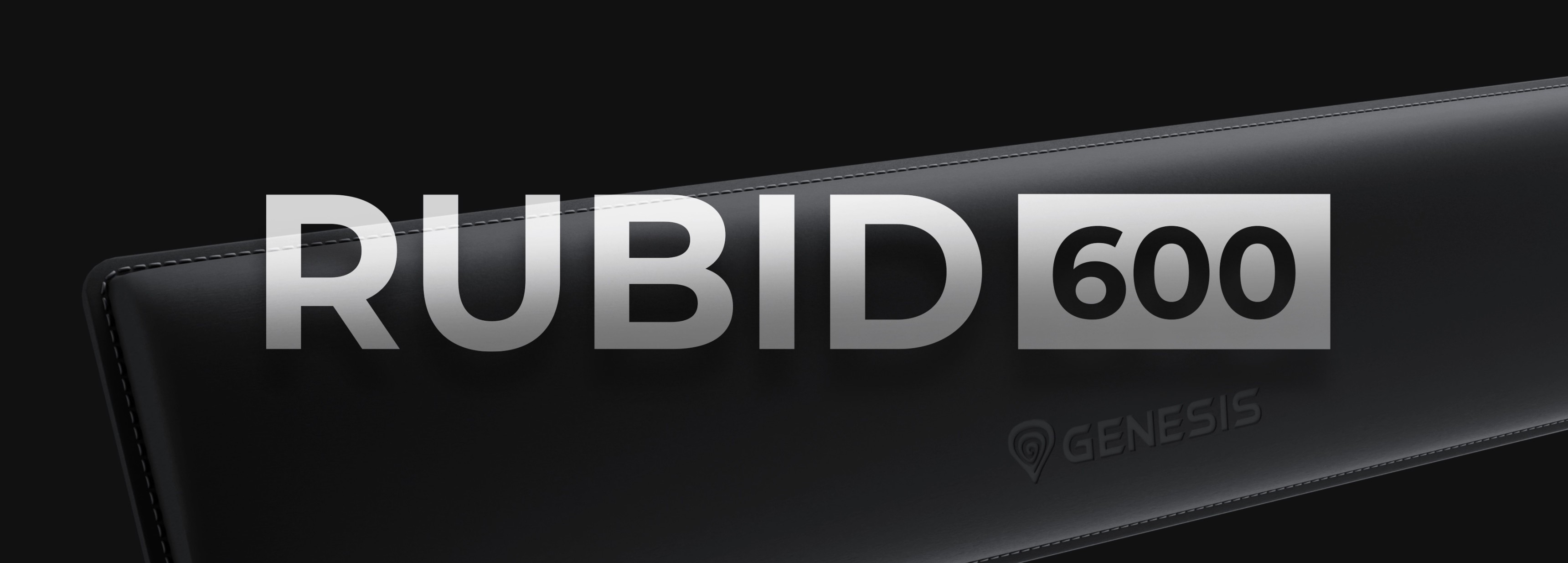 A sleek black surface featuring the words RUBID 600 and a logo below.